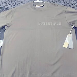 Brand new essential fear of god shirt size small but fits like med/lg